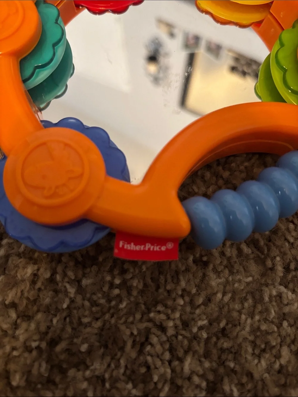 Fisher-Price Bright Orange Tambourine with Colorful Blue and Orange Rattles